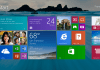 Windows 8.1 Pre-release Start screen with desktop background