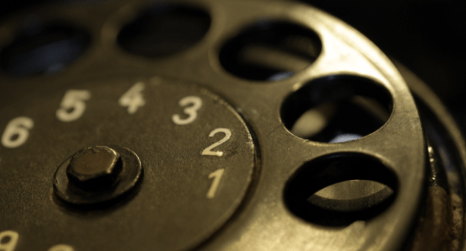 close up of a rotary telephone dial