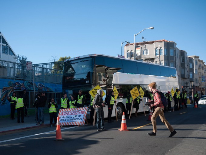 Protestors surround Google Bus in San Francisco in 2014.