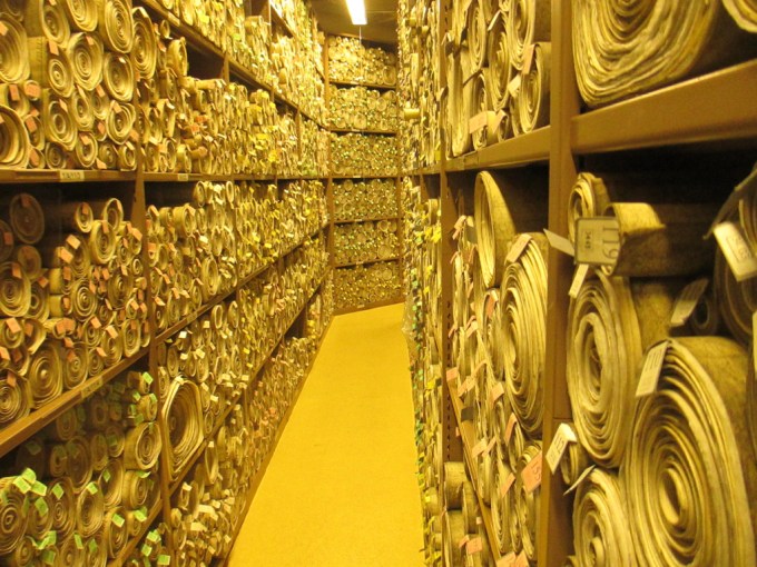 Rows and rows of scrolls in the Parliment's archive.