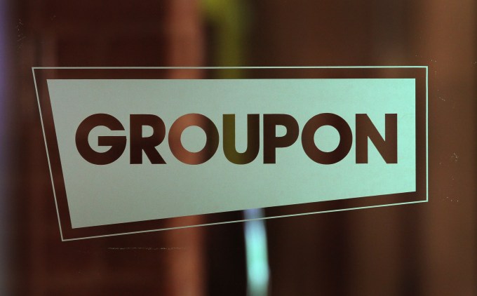 CHICAGO, IL - JUNE 10:  The Groupon logo is displayed in the company's international headquarters on June 10, 2011 in Chicago, Illinois. Groupon, a local e-commerce marketplace that connects merchants and consumers by offering goods and services at a discount, announced June 2 that it had filed with the Securities and Exchange Commission for a proposed initial public offering of its Class A common stock. The company, launched in Chicago in November 2008 now markets products and services in 43 countries around the world.  (Photo by Scott Olson/Getty Images)