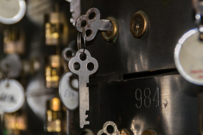Old fashioned keys in bank safe deposit box.