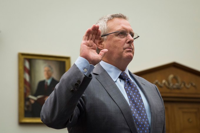 WASHINGTON, DC - MARCH 1: Bruce Sewell, Senior Vice President and General Counsel at Apple, Inc., is sworn in prior to testifying during a House Judiciary Committee hearing titled "The Encryption Tightrope: Balancing Americans' Security and Privacy," on Capitol Hill, March 1, 2016 in Washington, DC. Apple is fighting a court order requiring them to assist the FBI in opening the encrypted iPhone belonging to San Bernardino shooter Syed Farook. (Drew Angerer/Getty Images)
