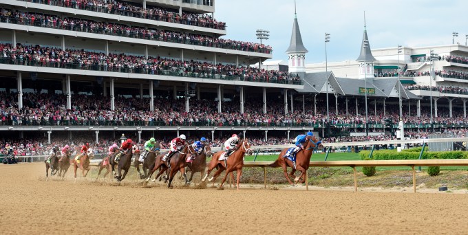 The first turn of the Kentucky Derby at Churchill Downs.
