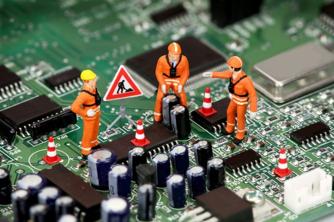miniature workers circuit board