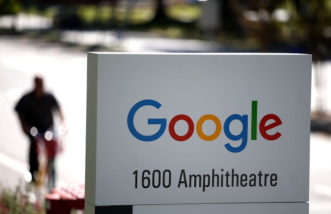 MOUNTAIN VIEW, CA - SEPTEMBER 02:  The new Google logo is displayed on a sign outside of the Google headquarters on September 2, 2015 in Mountain View, California.  Google has made the most dramatic change to their logo since 1999 and have replaced their signature serif font with a new typeface called Product Sans.  (Photo by Justin Sullivan/Getty Images)