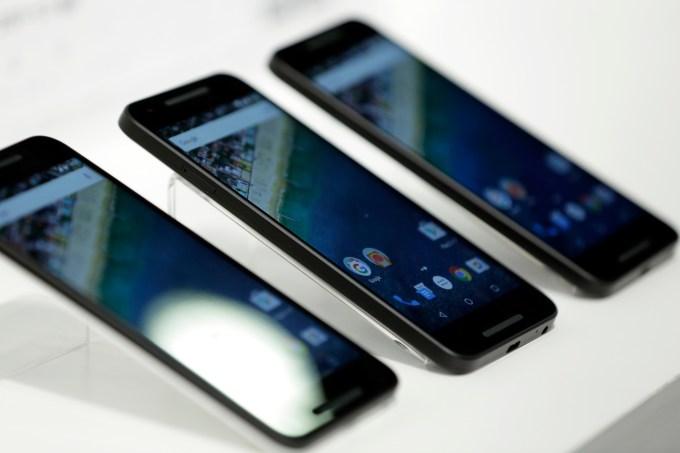Nexus 5X smartphone, co-developed by LG Electronics Inc. and Google Inc., and manufactured by LG Electronics, sit on display at the NTT Docomo Inc. unveiling in Tokyo, Japan, on Wednesday, Sept. 30, 2015. Docomo, Japans largest mobile-phone carrier by subscribers, introduced 10 smartphone models today. Photographer: Kiyoshi Ota/Bloomberg via Getty Images