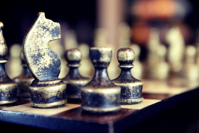 Close-Up Of Chess Pieces On Chess Board