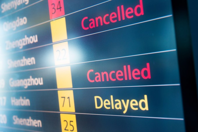 Detailed flight information board showing the flights delayed.
