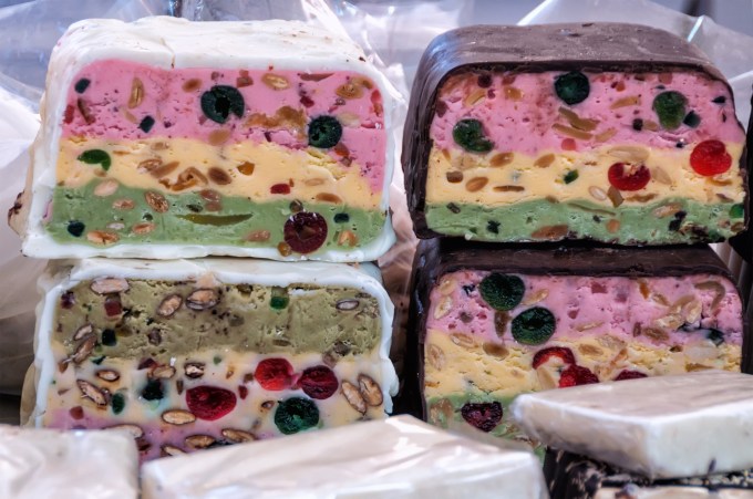 Various types of nougat strawberry and pistachio,Typical dessert of Italian cuisine, handmade and for sale in the days of celebration (Christmas, New Year, Carnival, Easter, etc.) in markets and shops of all cities. Here is Venice