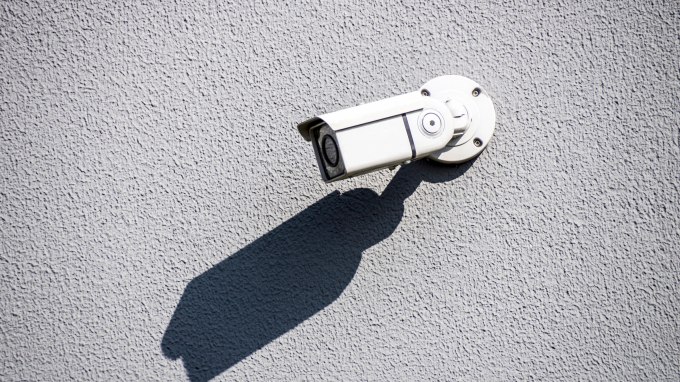 Low Angle View Of Security Camera On Wall
