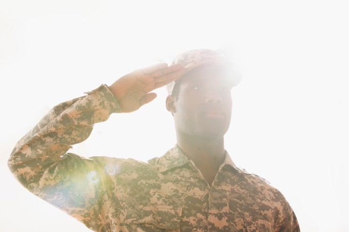 African American soldier saluting