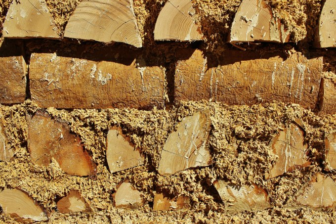 Wall made of hempcrete and logs in Saranac, Michigan. Hempcrete is a building product made from hemp hurds, lime and water with no mortar or chemical additives. This wall was constructed on the first site featuring a hempcrete building in the midwest. (Photo: Getty Images/Rick Thompson)