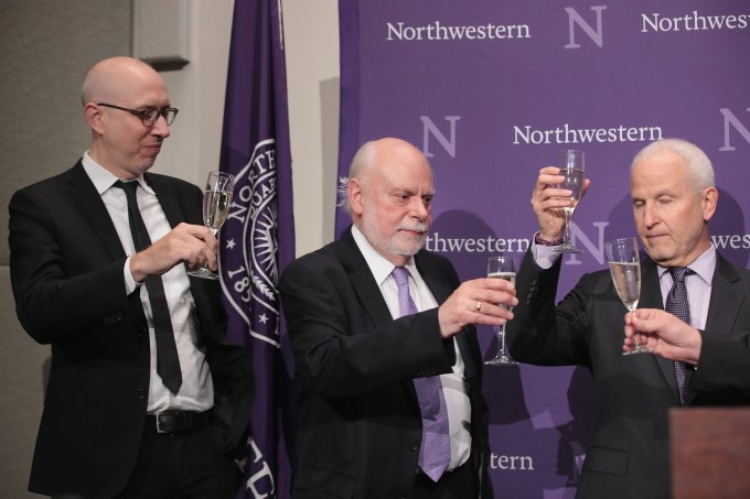 EVANSTON, IL - OCTOBER 05:  Professor Fraser Stoddart of Northwestern University toasts a glass of champagne with colleagues at a press conference after it was announced that he had won the 2016 Nobel Prize in Chemistry on October 5, 2016 in Evanston, Illinois. Stoddart shares the award with Jean-Pierre Sauvage, of the University of Strasbourg, France, and Bernard L. Feringa, of the University of Groningen, the Netherlands. The trio was awarded the prize for their work in "the design and synthesis of molecular machines."  (Photo by Scott Olson/Getty Images)