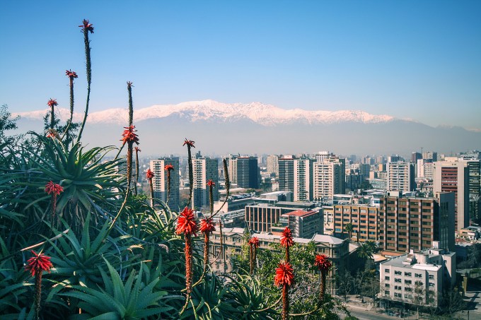 View of the Andes, plants and city from Santa Lucia Hill, Santiago, Chile