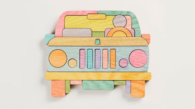 Wooden car jigsaw puzzle, complete and in pieces