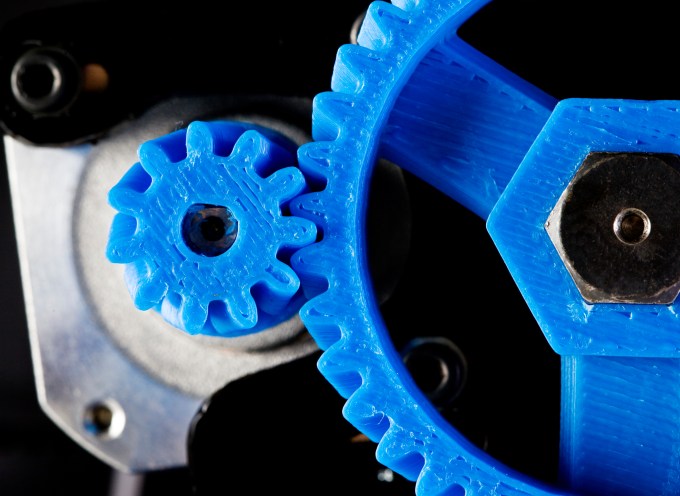 3D printer blue herringbone gears close up