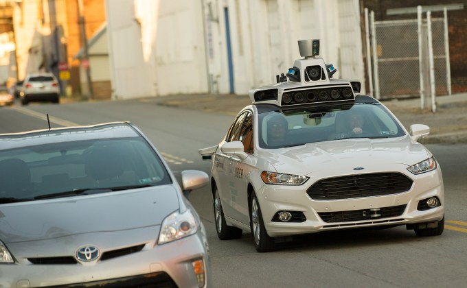 PITTSBURGH, PA - SEPTEMBER 22: An Uber driverless Ford Fusion drives down Smallman Street on September, 22, 2016 in Pittsburgh, Pennsylvania.  Uber has built its Uber Technical Center in Pittsburgh and is developing an autonomous vehicle that it hopes will be able to transport its millions of clients without the need for a driver.  (Photo by Jeff Swensen/Getty Images)