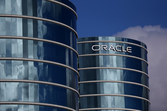 REDWOOD CITY, CA - DECEMBER 16:  The Oracle logo is displayed on the exterior of the Oracle headquarters on December 16, 2014 in Redwood City, California. Oracle will report second quarter earnings on Wednesday.  (Photo by Justin Sullivan/Getty Images)
