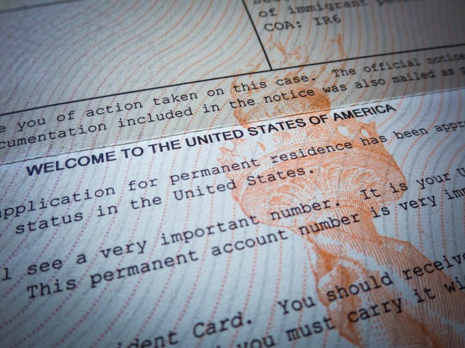 Detail of a Welcome to America Green Card acceptance letter for an immigrant.