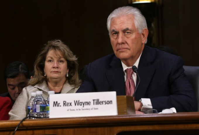 WASHINGTON, DC - JANUARY 11:  Renda Tillerson (L) listens during the confirmation hearing for her husband and former ExxonMobil CEO Rex Tillerson (R), U.S. President-elect Donald Trump's nominee for Secretary of State, before Senate Foreign Relations Committee January 11, 2017 on Capitol Hill in Washington, DC. Tillerson is expected to face tough questions regarding his ties with Russian President Vladimir Putin.  (Photo by Alex Wong/Getty Images)