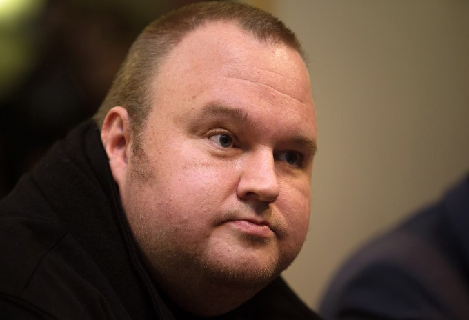 Kim Dotcom, founder of the Internet Party and founder of Megaupload Ltd., attends a news conference following an event titled "Moment of Truth" at the Auckland Townhall in Auckland, New Zealand, on Monday, Sept. 15, 2014. New Zealand Prime Minister John Key said he'll declassify intelligence service documents to disprove claims his government engaged in mass surveillance of its citizens after investigative journalist Glenn Greenwald, who published Edward Snowden's leaked U.S. National Security Agency documents last year, said he'll release more NSA files showing New Zealand's complicity in mass surveillance with its partners in the Five Eyes network. Photographer: Brendon O'Hagan/Bloomberg via Getty Images