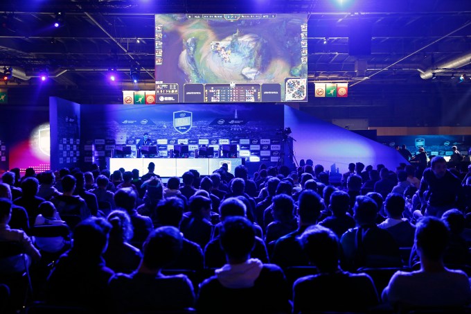 PARIS, FRANCE - OCTOBER 28:  Fans watch an electronic video game tournament with the game "League of Legends" developed by Riot Games during the "Paris Games Week" on October 28, 2016 in Paris, France.  "Paris Games Week" is an international trade fair for video games to be held from October 27 to October 31, 2016.  (Photo by Chesnot/Getty Images)