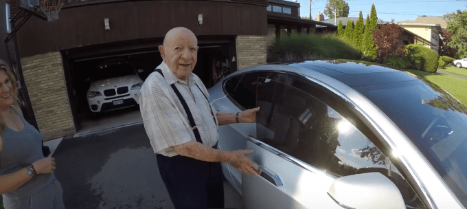 A Tesla owner shows his 97-year-old Grandpa a car from the future