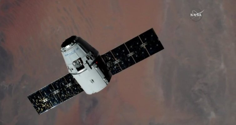 photo of SpaceX’s Dragon capsule successfully attached to ISS image